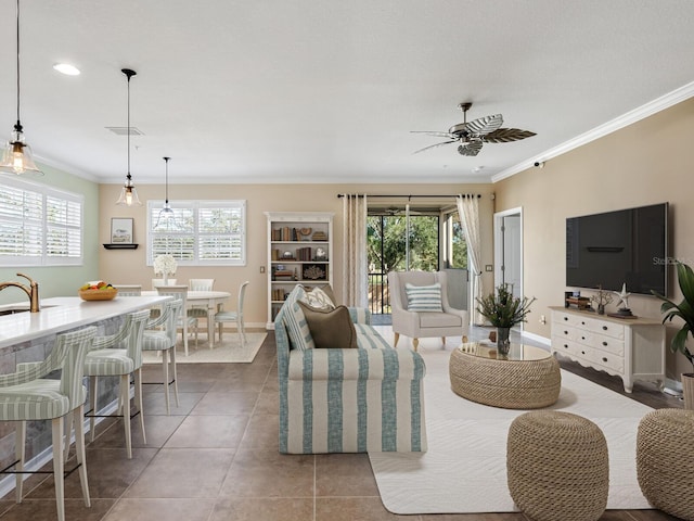 8133 Miramar Way Unit 201, Lakewood Ranch, FL 34202 - living room with ornamental molding, a ceiling fan, tile patterned flooring, and recessed lighting