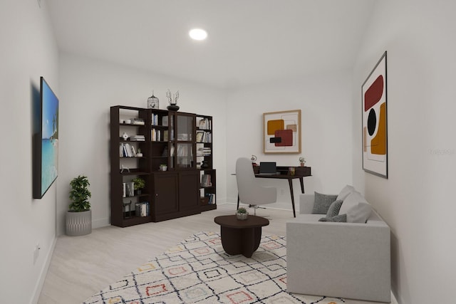 301 Quay Commons Unit 1111, Sarasota, FL 34236 - sitting room featuring baseboards and recessed lighting