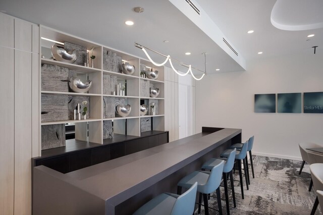301 Quay Commons Unit 1111, Sarasota, FL 34236 - bar featuring recessed lighting