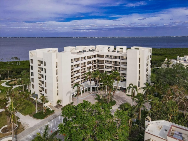 view of building exterior with a water view