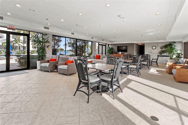 dining space with light tile patterned floors