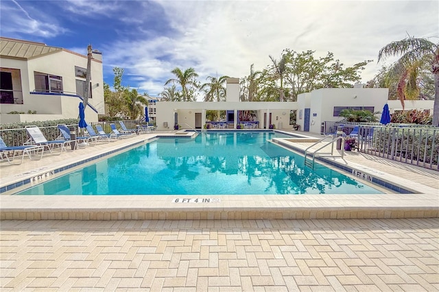 view of pool featuring a patio area