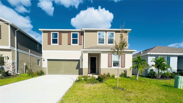 view of front of home with a garage and a front lawn