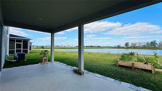 view of patio / terrace with a water view and central air condition unit