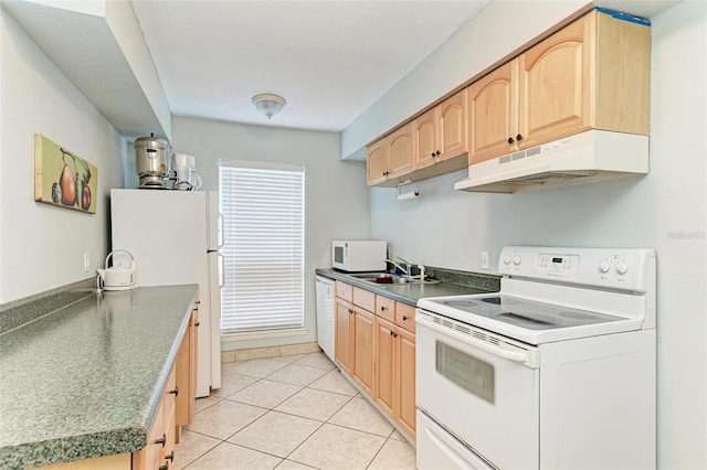 kitchen featuring light brown cabinets, white appliances, light tile patterned floors, and sink