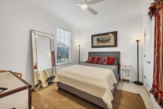 bedroom featuring ceiling fan, ornamental molding, and light tile patterned floors