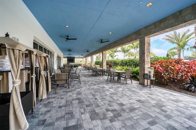 view of patio with ceiling fan