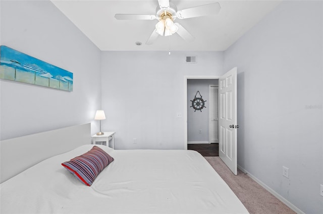 carpeted bedroom featuring ceiling fan