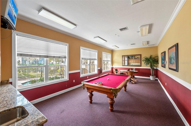 rec room with crown molding and billiards