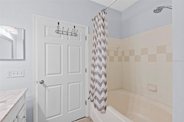 bathroom with vanity and shower / tub combo with curtain