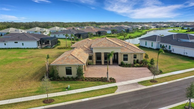 view of front of house featuring a water view and a front yard