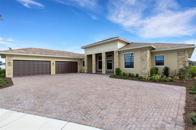 prairie-style home with a garage