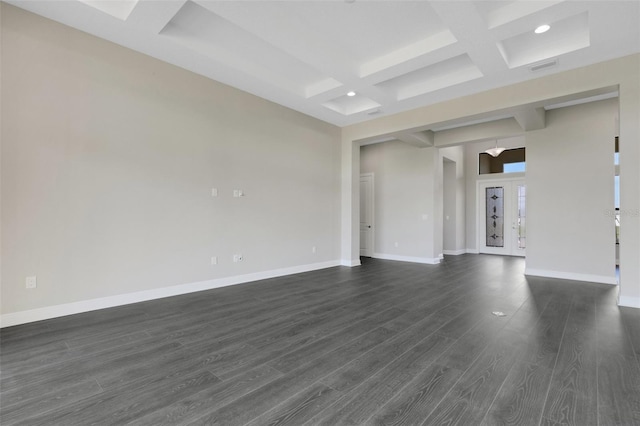 unfurnished living room featuring beam ceiling, dark hardwood / wood-style flooring, and coffered ceiling