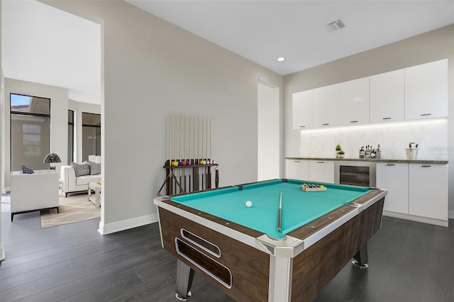 game room featuring beverage cooler, dark wood-type flooring, and billiards