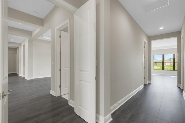 hallway featuring dark hardwood / wood-style flooring