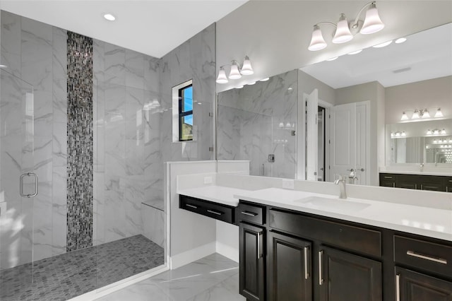 bathroom with vanity and walk in shower