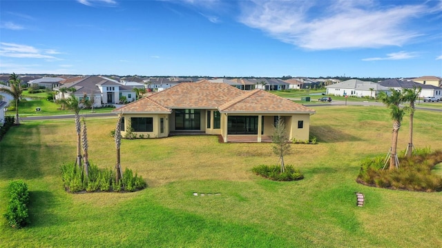 view of front of house with a front lawn