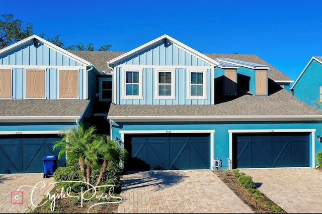 view of front of property with a garage