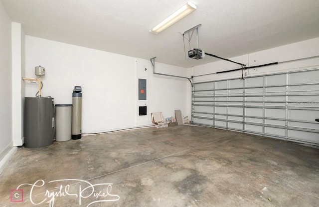 garage with electric panel, a garage door opener, and water heater