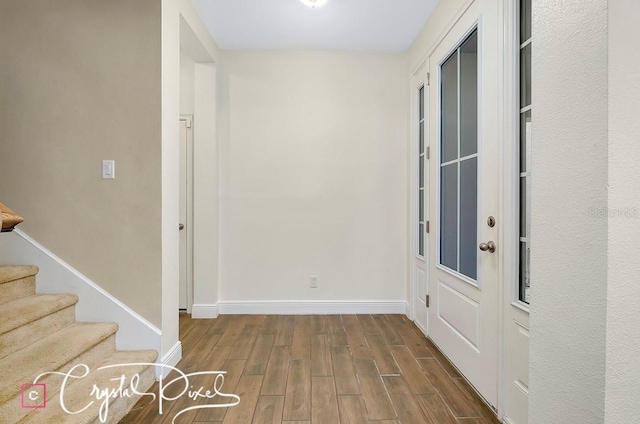 entrance foyer with hardwood / wood-style floors