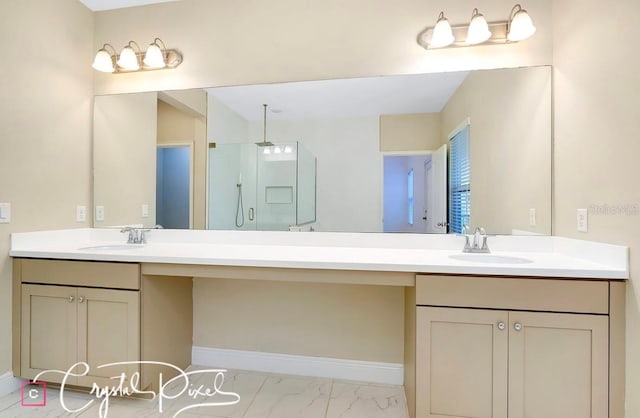 bathroom with vanity and a shower with door