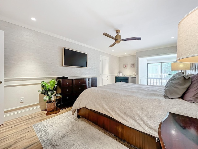 bedroom with light hardwood / wood-style flooring, ceiling fan, and crown molding