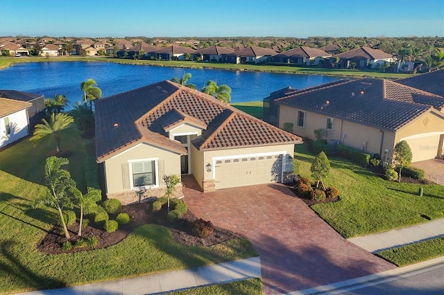 bird's eye view with a water view