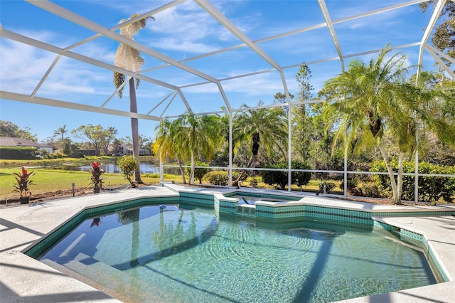 view of pool with a patio area, a lanai, an in ground hot tub, and a water view