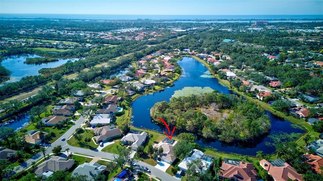 drone / aerial view with a water view