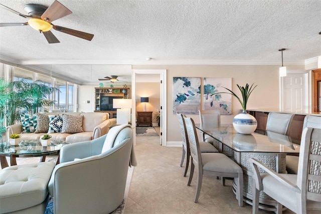 tiled living room featuring a textured ceiling and ornamental molding