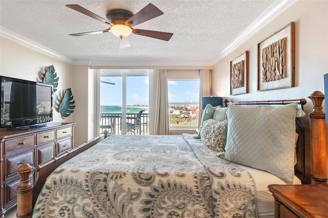 bedroom featuring access to exterior, a textured ceiling, ceiling fan, and ornamental molding