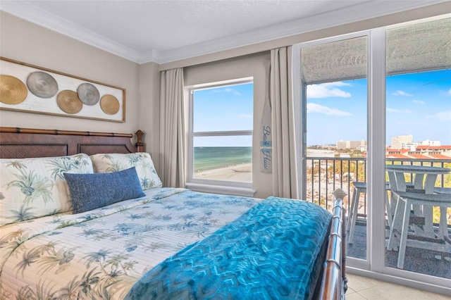 bedroom featuring a water view, access to exterior, crown molding, and light tile patterned floors