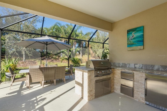 view of patio / terrace featuring exterior kitchen, outdoor dining area, grilling area, and a lanai