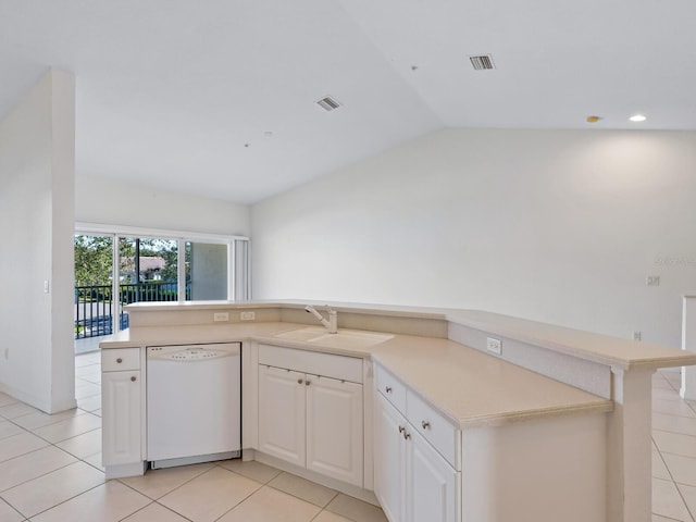 kitchen featuring dishwasher, white cabinets, lofted ceiling, and light tile patterned floors