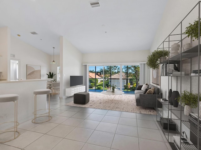 living room with light tile patterned floors and high vaulted ceiling