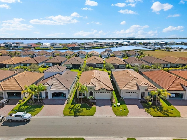 drone / aerial view with a water view