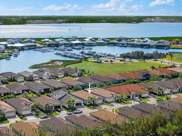 drone / aerial view with a water view