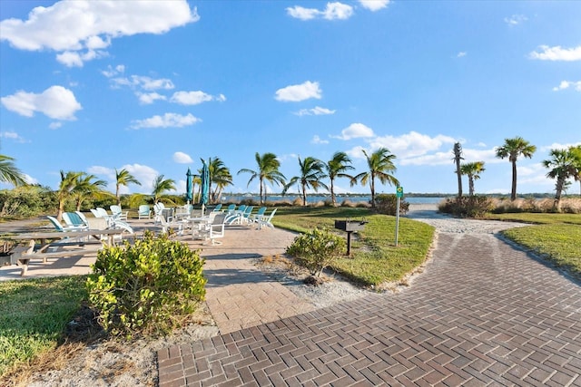 view of property's community with a patio area