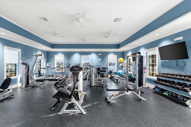 workout area featuring ceiling fan, visible vents, and baseboards