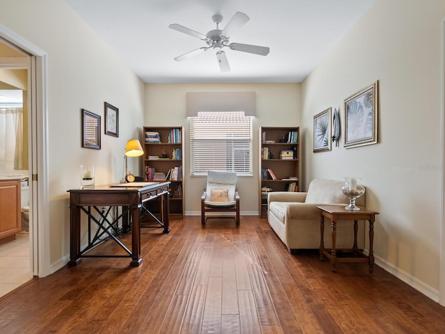 home office featuring ceiling fan and dark hardwood / wood-style flooring