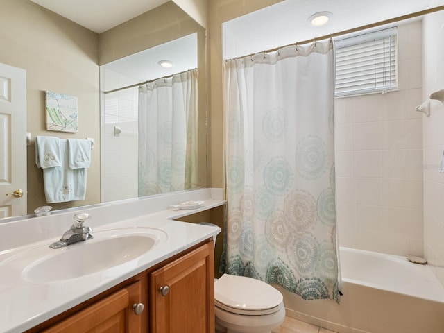 full bathroom with shower / tub combo, vanity, and toilet