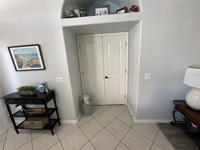 interior space with light tile patterned flooring