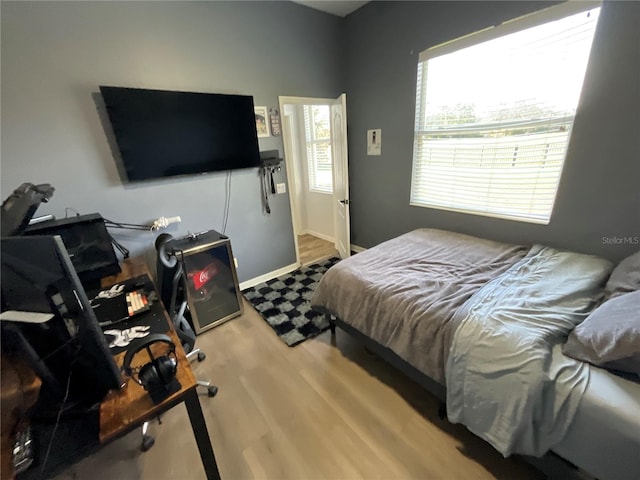 bedroom with light wood-type flooring