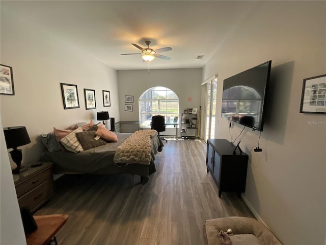 bedroom featuring hardwood / wood-style floors and ceiling fan