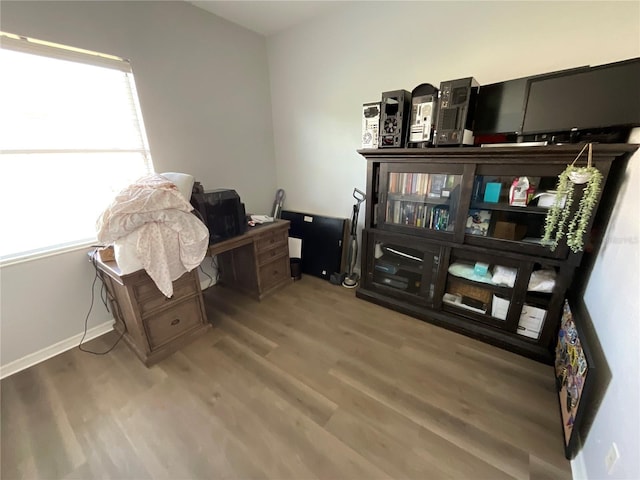 office area with hardwood / wood-style floors