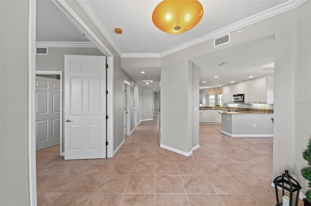 interior space featuring crown molding