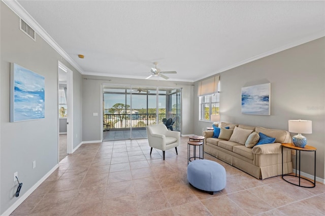 tiled living room with ceiling fan and ornamental molding