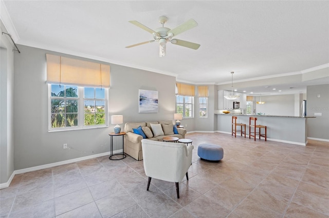 living room featuring ceiling fan, light tile patterned flooring, and ornamental molding