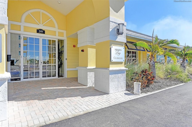 entrance to property featuring french doors