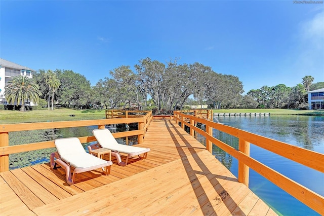 view of dock with a water view